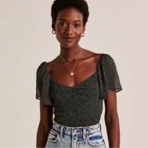 Abercrombie Smocked Flutter Sleeve Top black dot size S